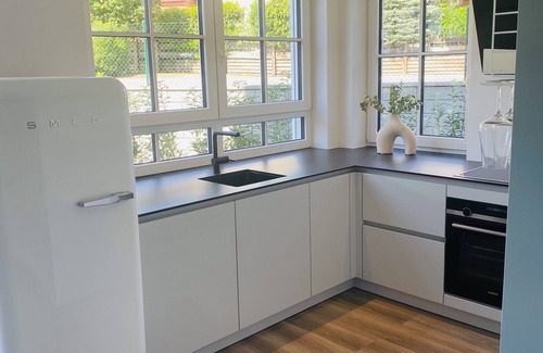 Bad Wiessee Apartment | New, with garden, garage parking space, own children's room and yoga & fitness gadgets