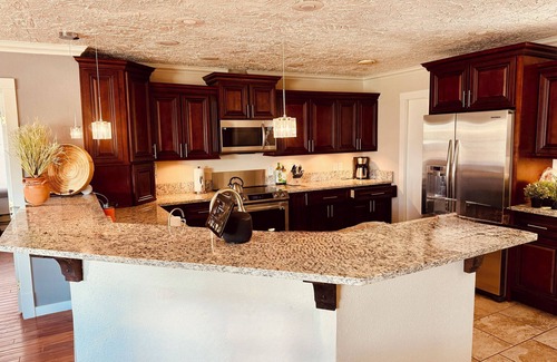 Rimrock House | Newly Renovated 3BR Oasis - Close to Dining + Private Backyard Fire Pit
