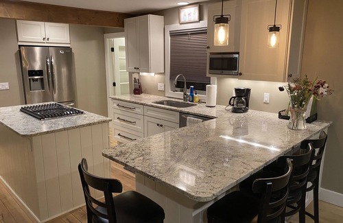 Petoskey House | Newly Renovated Cottage on crooked lake. sleeps up to 6 with no service fees!