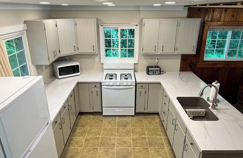 Angola Cottage | Newly renovated kitchen 2024. Dead end Street, Large Yard, not on a hilltop.