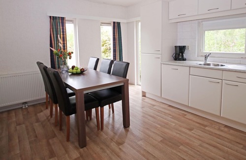 Appelscha Ski Chalet | Nice chalet with dishwasher surrounded by greenery