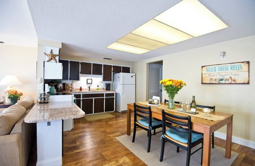 New Smyrna Beach Apartment | NO PET FEES - Angel Inn the Sand - Fish Unit Upstairs North Direct Beach Front