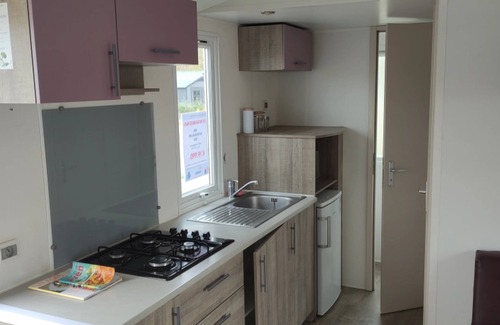 Lauwersoog Ski Chalet | North Sea chalet directly on the Lauwersmeer - within walking distance of the North Sea! Siblu Family Park