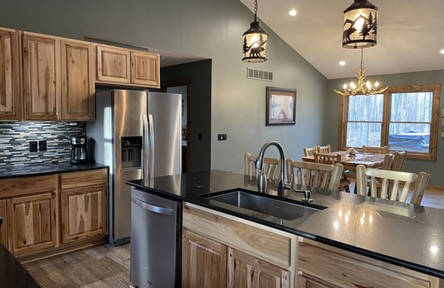 Elmira Cabin | Northern MI Log Cabin Inn–Hot Tub, Trails, Pools, Golf