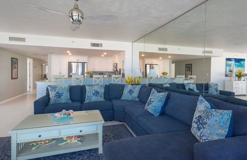 Bethune Beach Condo | Ocean Condo 104 ~ Ground Floor Corner Condo with wrap around balcony! Walk right out to Pool!