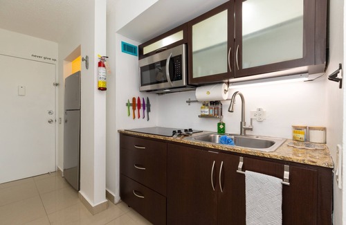 Carolina Apartment | Oceanfront Oasis: Beach Studio with Sunset Views & Parking – 5 Mins from SJU