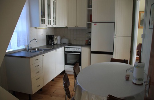 Eyrarbakki Cottage | Old house by the sea, Vulcan Hekla in front of the window, HG-00005951