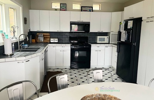 Traverse City House | On Bass Lake in TC, Game room. A/C, fireplace. Pet ok.