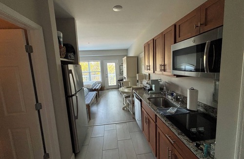 Southport Condo | On the picturesque SPT Waterfront! Beautiful Pool & Private Beach!