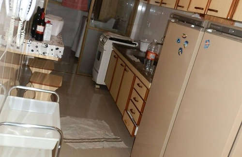 Jardim Vitoria Apartment | One block from the cove beach in Guarujá - 2 suites