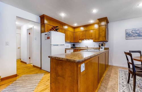 Jackson Hole Condo | Open and inviting, two-story condo with full kitchen, patio, and wildlife views
