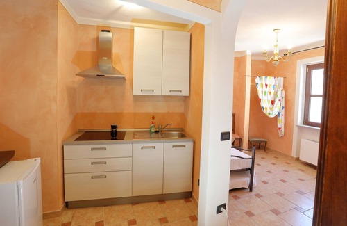 Casaleggio Boiro House | Orange Room