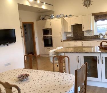 Castle Bytham House | Orchard Cottage, Clematis cottages, Stamford. Accessible luxury home.
