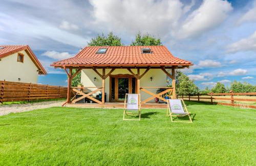 Sierakowice House | Ostoja Lemany - domki na Kaszubach, sauna, balia-jacuzzi, plac zabaw, tyrolka , dwa boiska, miejsce na ognisko, grill gazowy