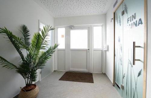 Gronenberg House | Ostseecamp Lübecker Bucht Ferienhaus "Beachhouse" mit kostenlosen Saunazugang