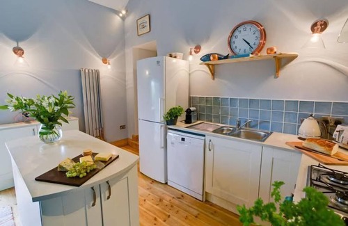 Llanfaethlu Apartment | Oyster Catcher - a ground floor bedroom that sleeps 6 guests in 3 bedrooms