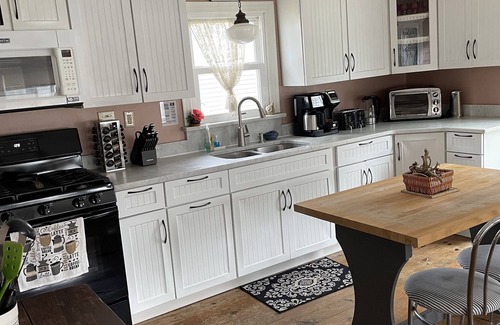 Chincoteague Cottage | Oysterhaven Cottage with partial Water views! New balcony! Close to Fairgrounds!