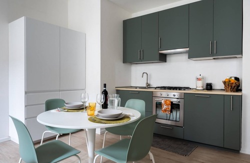 Parma City Centre Apartment | Palazzo Tarasconi Petrol Color Apartment