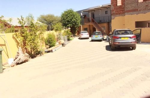 Windhoek House | Pandeinge - Family Room with Bathroom