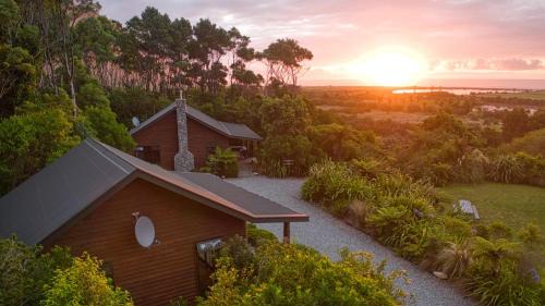 Barrytown House | Paparoa Beach Hideaway with Hot Tub