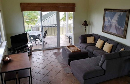 Freeport House | Paradise is Due South! One level main house and 2 story complete guest house.
