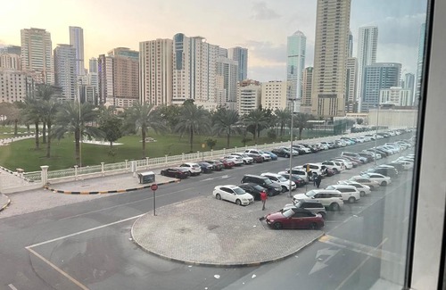 Al Majaz House | Park view bedroom in family apartment