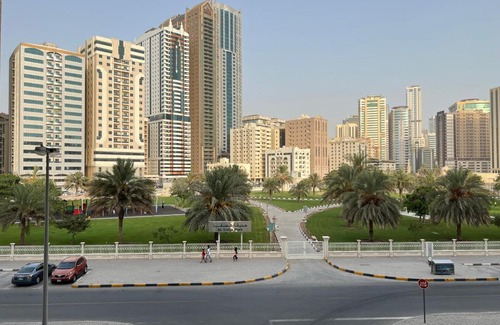 Al Majaz House | Park view bedroom in family apartment