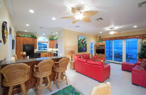 North Side House | Parrot-ise 4 Bedroom Oceanfront Villa in Cayman Kai