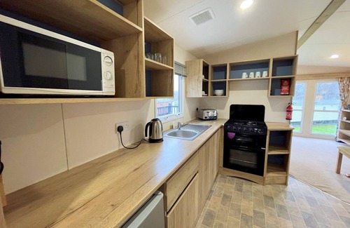 Beattock House | Pass the Keys | Cosy 3BR Getaway in Beautiful Country Park