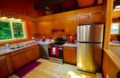 Meredith House | Patrician Shores 4 BR Winnipesaukee access partial water views