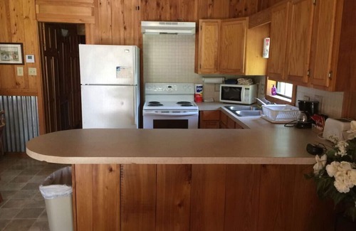 Lake Village Cabin | Peaceful cabin tucked in back of orchard with lake access
