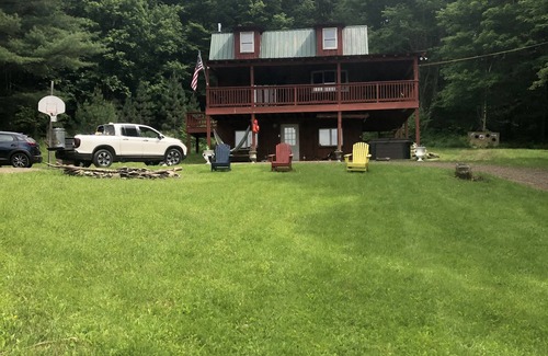 Walton House | Peaceful Cabin with Hot Tub, Game Room & Pond View