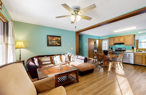 Swanton Cabin | Peaceful hideaway with large yard, hot tub, grill, firepit, smart TVs, & AC