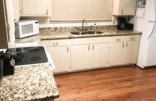 Centerville Cottage | Peaceful Hills Retreat’s cottage is clean and cozy with a creek on 97 acres