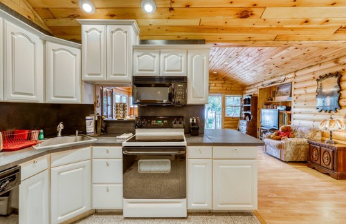 Brant Lake House | Peaceful lakefront house with private dock and sandy beach