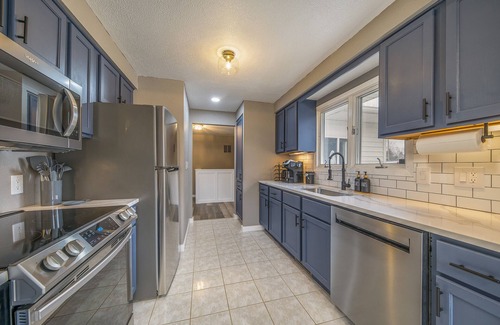 Delton House | Peaceful & Private Lakefront House on Shelp Lake, hot tub is open year round