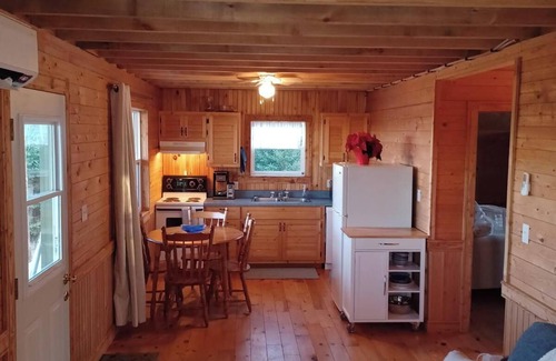 Souris Cottage | Peaceful river view cottage close to world class sandy beaches