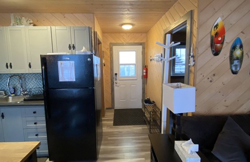 Belmont Cabin | PELICANS NEST Family or couples get away with hot tub on the water