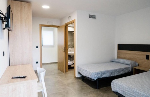 Caspe House | Pensión La Buena Vida