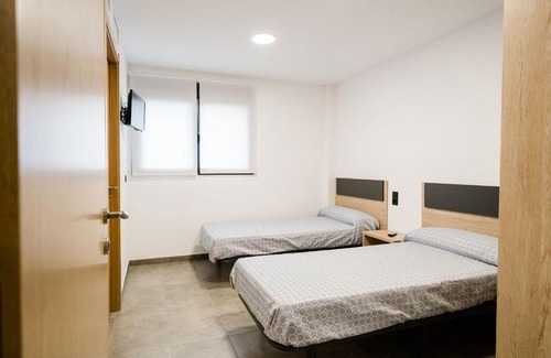 Caspe House | Pensión La Buena Vida