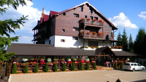 Baisoara House | Pensiunea Skiland