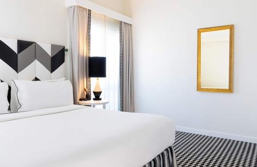 Norma Triangle Hotel | Penthouse View, Four Spacious Units in West Hollywood! Rooftop Heated Pool!