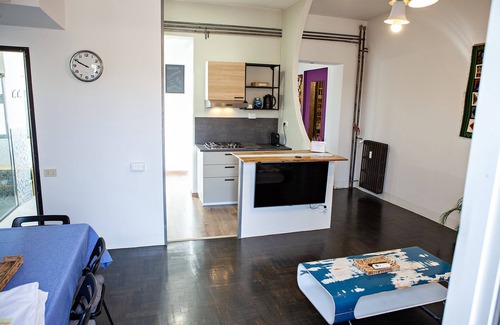 Monti Apartment | Penthouse with large terrace overlooking Colosseum and center of Rome.