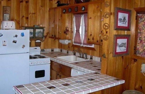 Carp Lake Cottage | Pet-Friendly Acorn Cottage. nOur cottage is our home - you'll feel at home too!