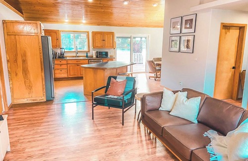 Thompson Falls House | Picturesque Riverfront Getaway with Striking Views