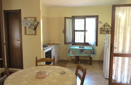 Alghero Villa | Podere le Bombarde, 150 meters from the sea, for 5 people, with garden and verandas