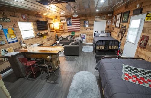 Hayesville Cabin | Ponderosa, Nice Open room by creek with two beds, full bath, living area, TV.