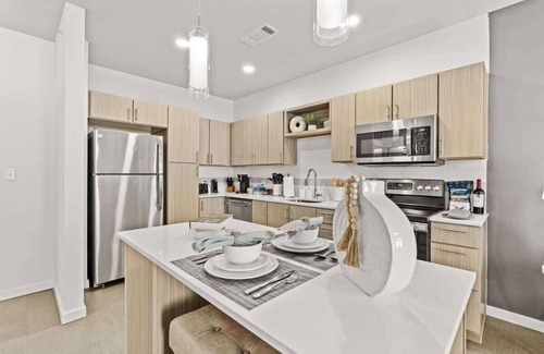 Rogers Apartment | Pool & Gym Access Grill LCP Collection