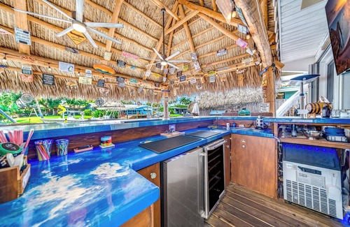Coral Ridge Isles House | Pool! Waterfront+Tiki Hut Bar! Golf Cart Included!