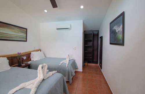 Playa Gigante Hotel | Poolside Family Room with 2 twin beds